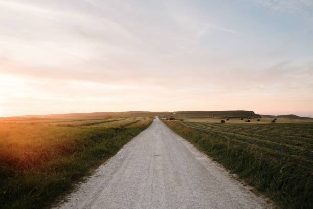 istock Rural dirt road at sunset 2148728858