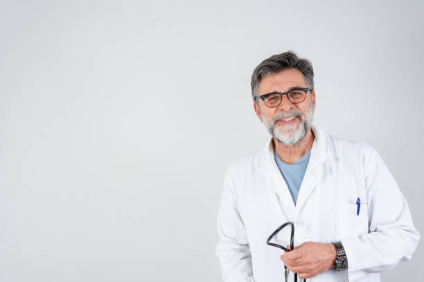 istock Male Doctor Against Gray Background 2148730546