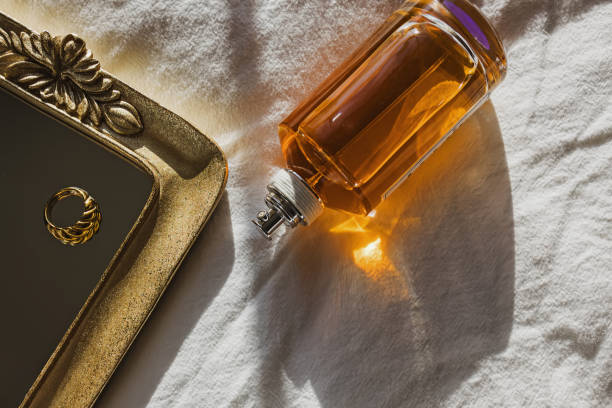 istock Bottle of perfume in morning light, still life composition 2148733295
