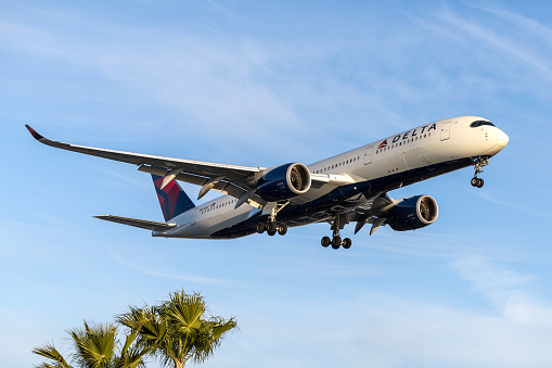 Los Angeles, California, USA - April 8, 2024: A Delta Air Lines Airbus A350 approaching Los Angeles International Airport.