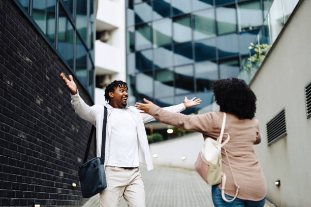 istock Couple of business persons walking together and talking 2148734607