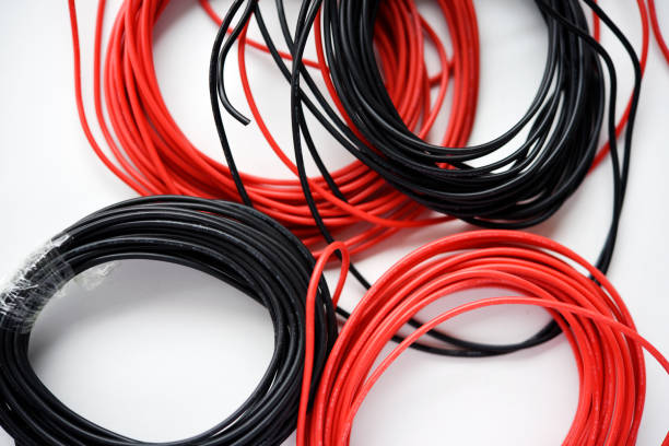 istock Wires for electronics on a white background. Two coils of red and black wires. 2148742678