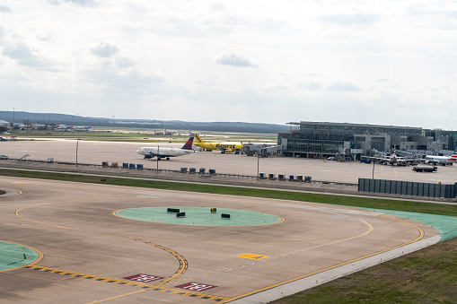 February 26, 2023 - Austin Bergstrom International Airport, Austin, Texas, USA:  Taxiway area and commuter jets at the airport in Austin Texas
