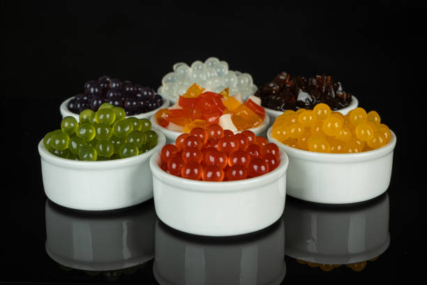 istock Different tapioca pearls for bubble tea. Bubble tea ingredients arrangement in bowls 2148744077
