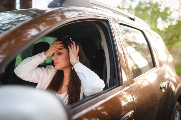 istock Stressed woman stuck in the car while travelling 2148745611