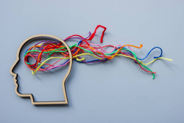 istock Neurodiversity, autism or creativity abstract. Head outline and colored threads. 2148746819