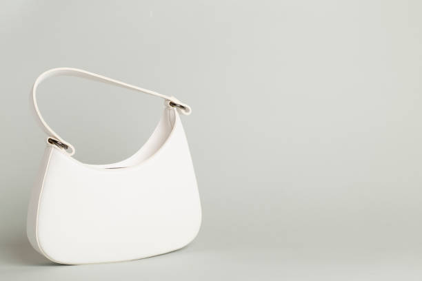 istock Trendy woman bag on color background 2148747206
