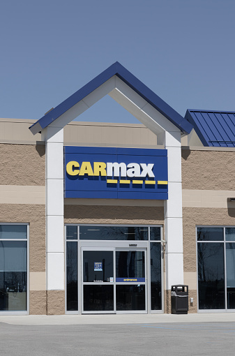 Indianapolis - April 13, 2024: CarMax Auto Dealership. CarMax is the largest used and pre-owned car retailer in the US.