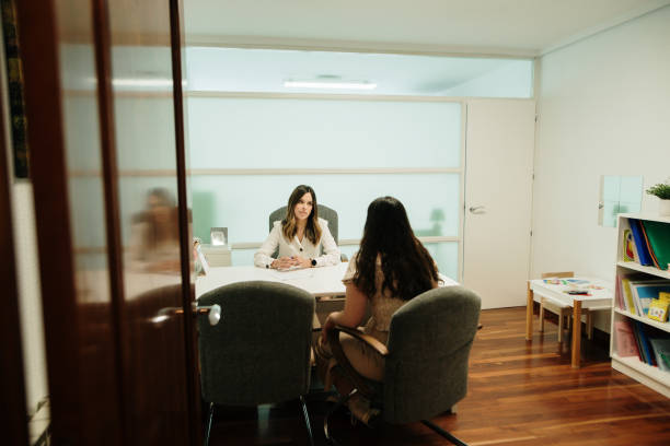 A doctor and a patient in an office