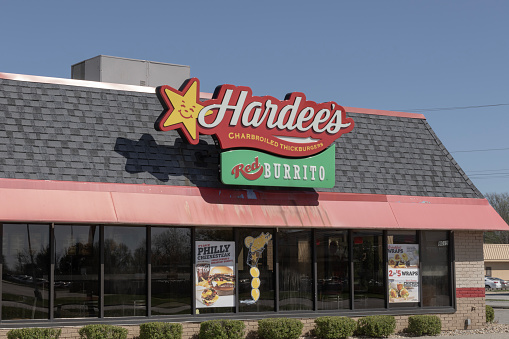 Indianapolis - April 13, 2024: Hardee's fast food restaurant location. Hardee's is operated by CKE and the sister restaurant of Carl's Jr.