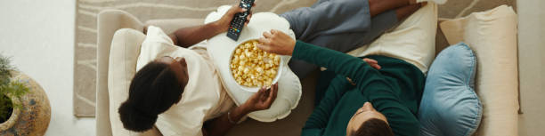 istock Couple Watching Show Episode 2148749390