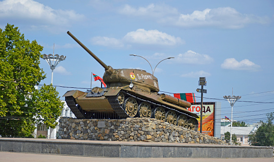 Tiraspol, Moldova - August 31, 2022: T-34-85 tank on the pedestal of the glory memorial in the city of Tiraspol. a place of worship for those fallen in the Great Patriotic War