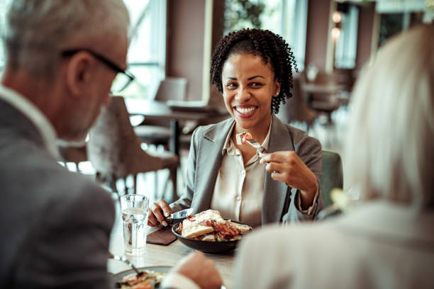 istock Colleagues having lunch together at the restaurant 2148751415