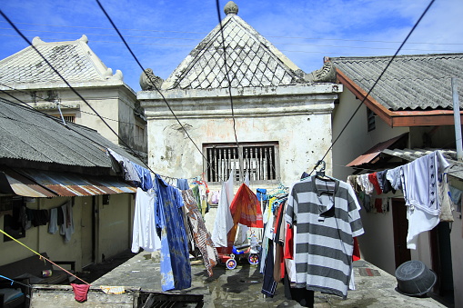 Yogyakarta, Indonesia, June 14, 2013. Residents drying clothes in the cultural heritage area of Taman Sari Water Castle which became an important icon of Yogyakarta Palace.