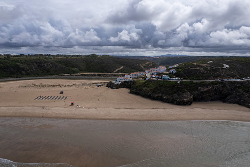 Drone view of the sandy beaches of Praia de Odeceixe from the ocean side