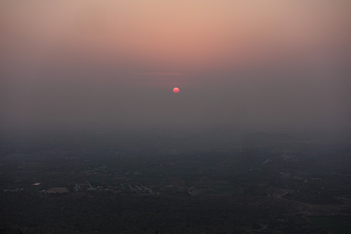 Sunset over the hazy city of Jaipur, Rajasthan