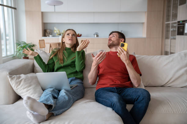 istock Couple irritated by noisy neighbor, loud sound creating problem for rest, work at home on weekends 2148754844