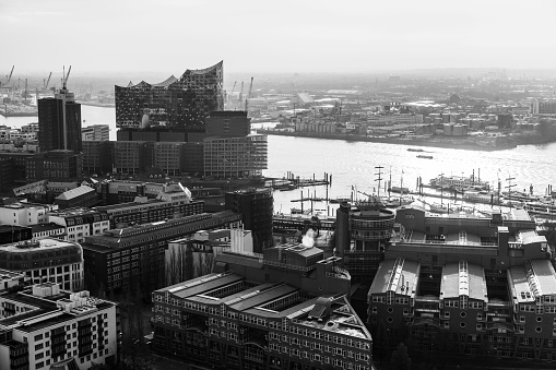 Hamburg; Germany - November 26; 2018: Hamburg aerial view. Elbe river coast. Retro stylized black and white photo