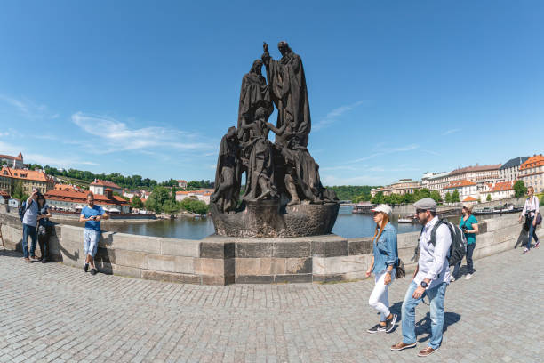 Prague, Czech Republic - May 28, 2017: People walking on the Charles Bridge
