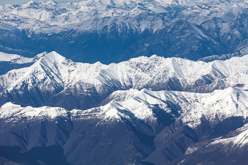Aerial view of Himalaya mountains. View from airplane window.