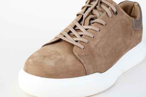 Comfortable suede shoe on white background