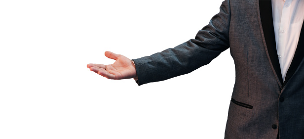 Man showing his palm on the left side, casually standing with free space white backdrop