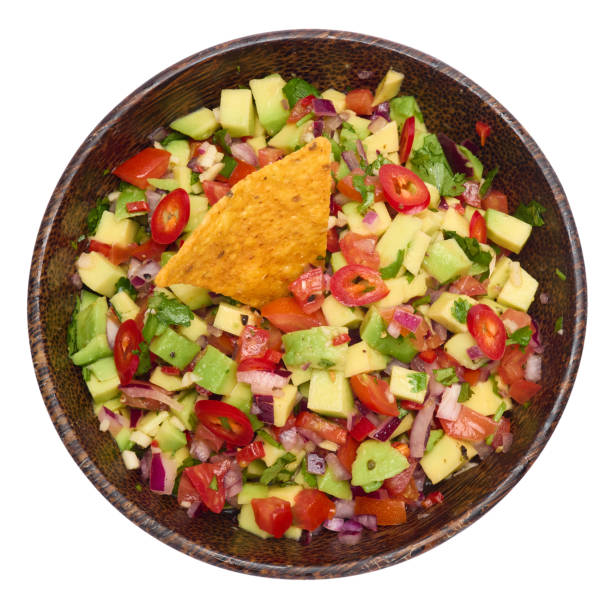 istock traditional salsa dip snack in wooden bowl and corn nacho chips isolated 2148765522