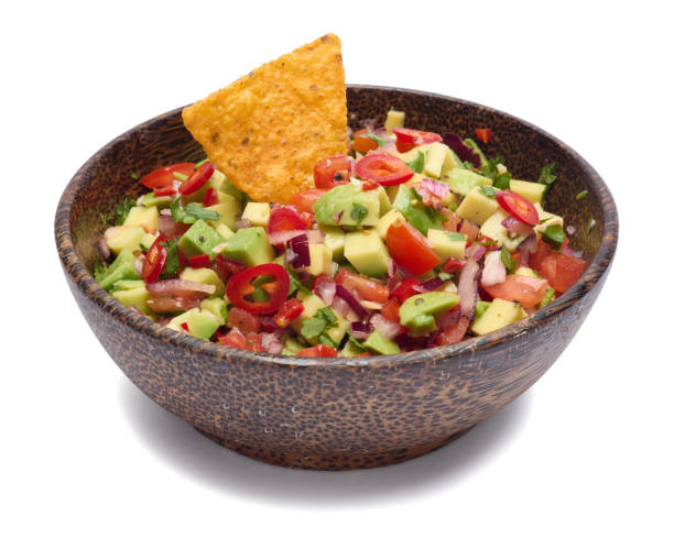istock traditional salsa dip snack in wooden bowl and corn nacho chips isolated 2148765523