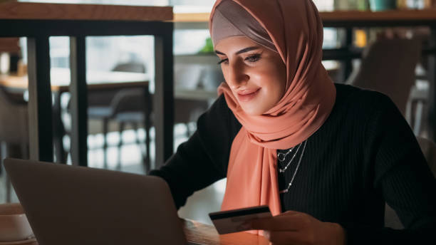 istock Online payment internet buy woman hijab e-commerce 2148765697