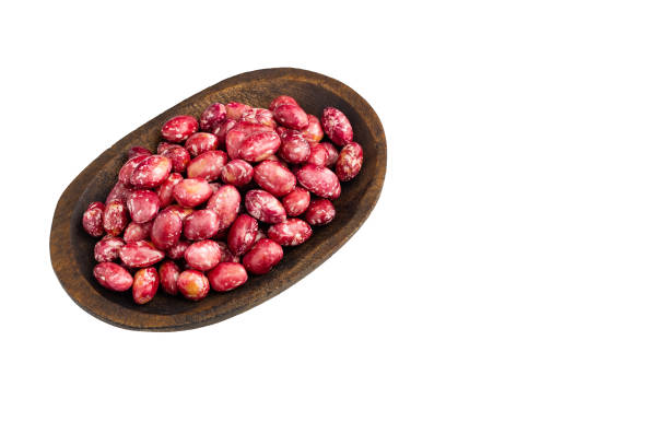 Fresh borlotti seeds in the wooden bowl - Phaseolus vulgaris pinto