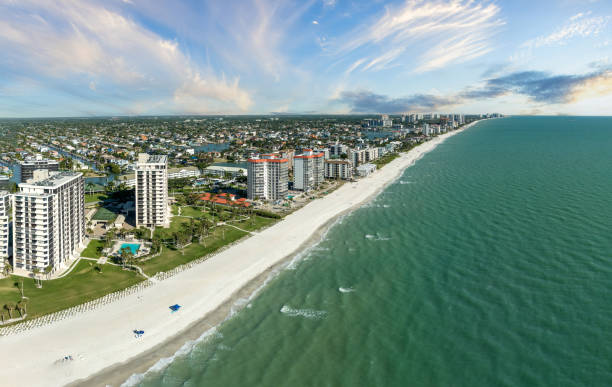 istock Blue sky over the beach along a Gulf Coast beach 2148769733