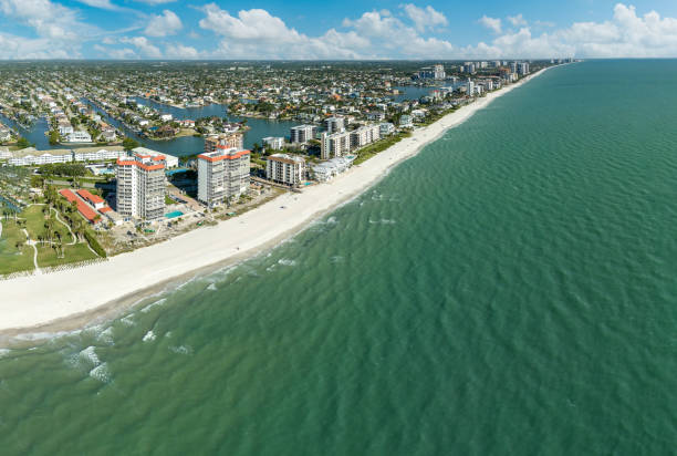 istock Blue sky over the beach along a Gulf Coast beach 2148769754