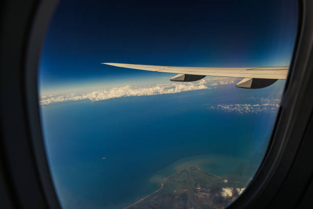 istock Beautiful view of the airplane wing and the sea. 2148770607