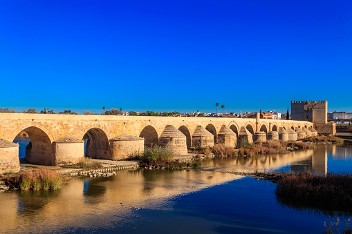 Roman bridge over Guadalquivir river in Cordoba, Spain