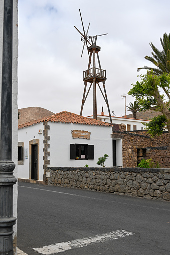 Betancuria, Fuerteventura, Spain, February 27, 2024 - Traditional wind pump for agricultural water harvesting in Betancuria, Fuerteventura, Canary Islands, Spain.