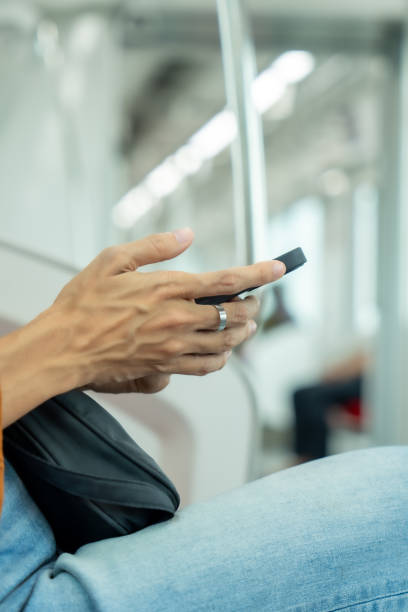 istock A woman is traveling on public transport. 2148773055