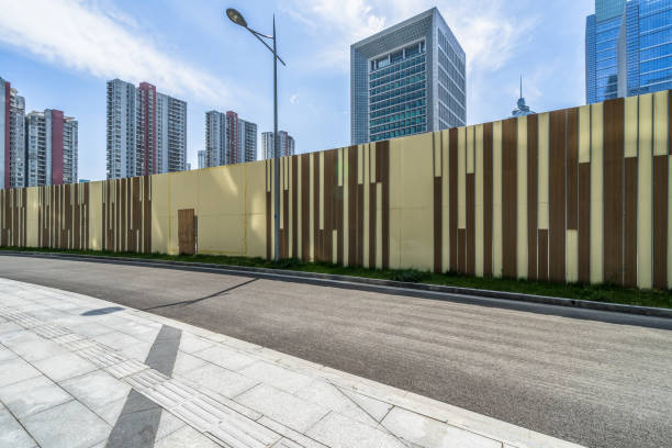 istock empty pavement and modern buildings in city 2148773251