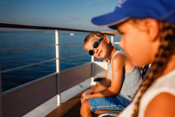 istock Kids relaxing on a boat ride. Summer vacation 2148773713