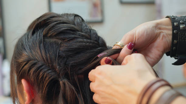 istock Graduation hairstyle prep. Celebrating high school graduation. 2148774895
