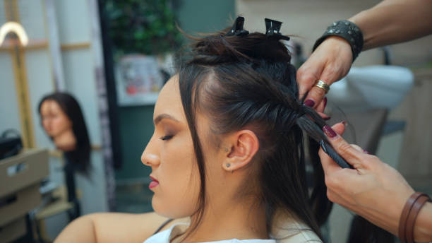 istock Graduation hairstyle prep. Celebrating high school graduation. 2148774898