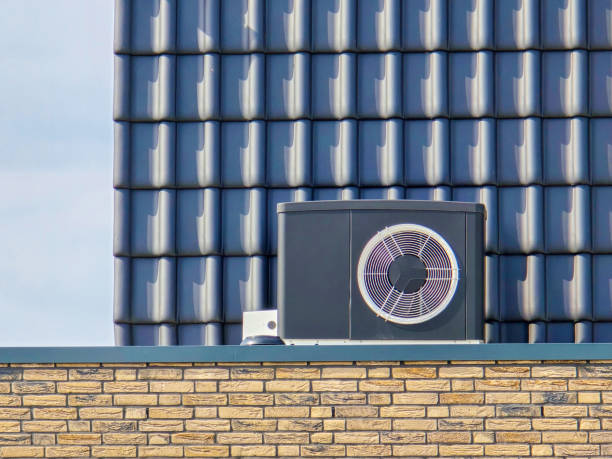 istock air source heat pump unit installed outdoors at a modern home with bricks in the Netherlands 2148777170