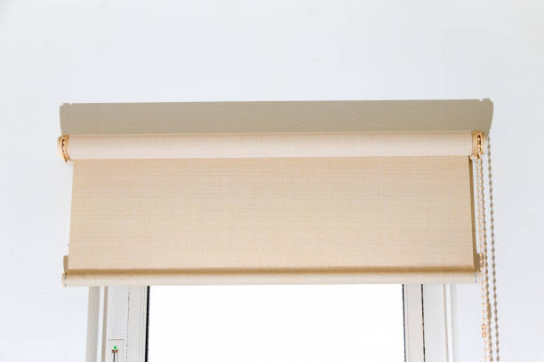 istock Roll screen attached to the top of a small window 2148780013