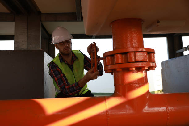 istock Mechanical technician operate piping valve , Industrial and factory concept 2148782348