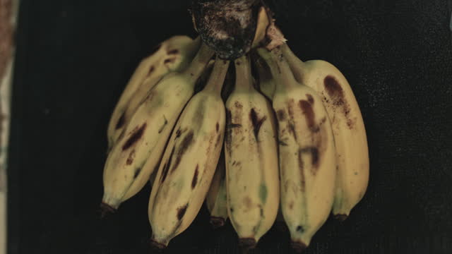 Bunch of bananas on black background