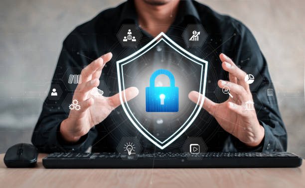 istock Businessman holding shield protect icon. Protection network security computer and safe your data concept, lock symbol, concept about security, cybersecurity and protection against dangers. 2148783694