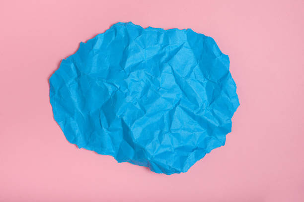 top view of white crumpled page on white background