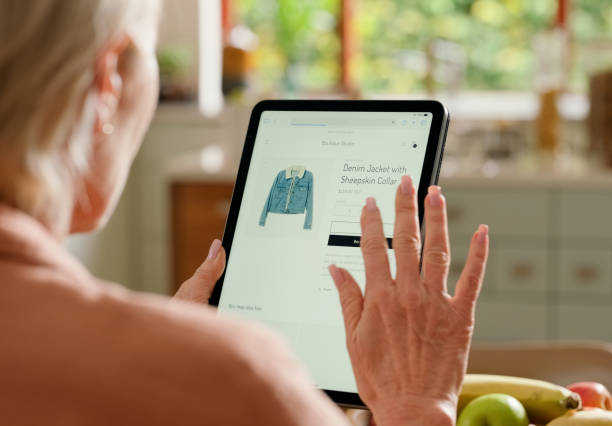 istock Hands, home and tablet screen for clothes e commerce, catalog or online shopping with search or choice. Person or customer scroll on digital technology for user experience, fashion and click on order 2148788419