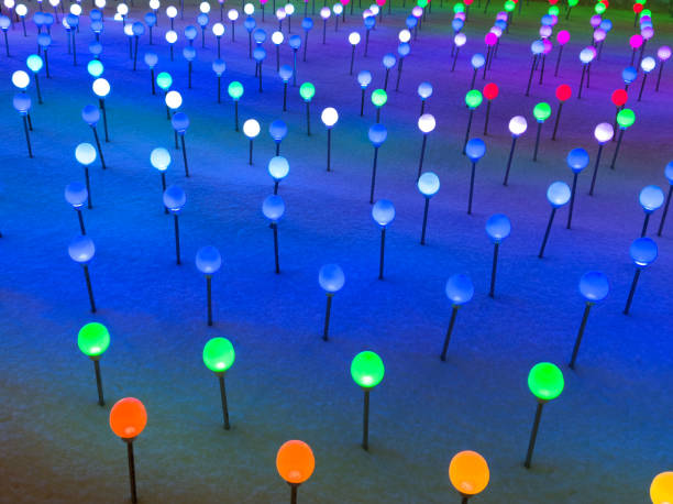 istock Multi-colored lanterns on the snow in the park as an abstract background. Texture 2148788554