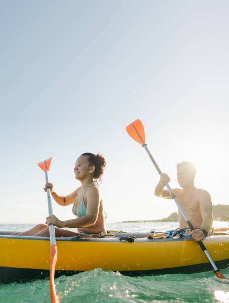 istock Romantic couple kayaking at sunset 2148789117