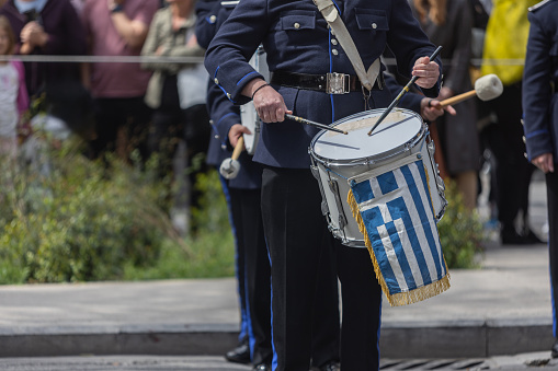 Midsection shot of unrecognizable members of a military band in full uniform in parade during National Anniversary of Greece in Athens